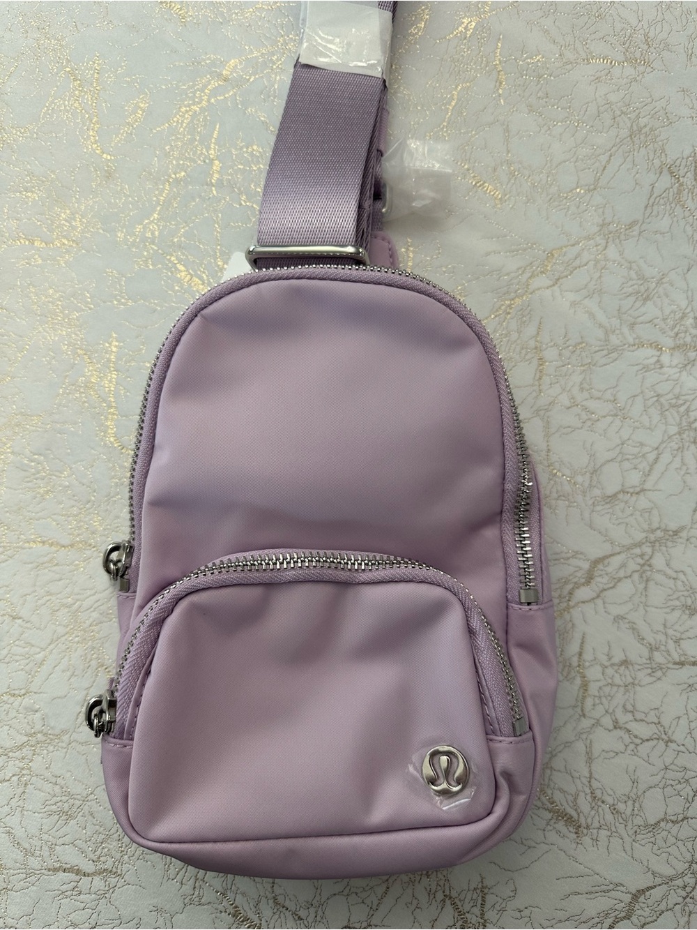 Lululemon Everywhere Sling Bag Small in Lilac Play